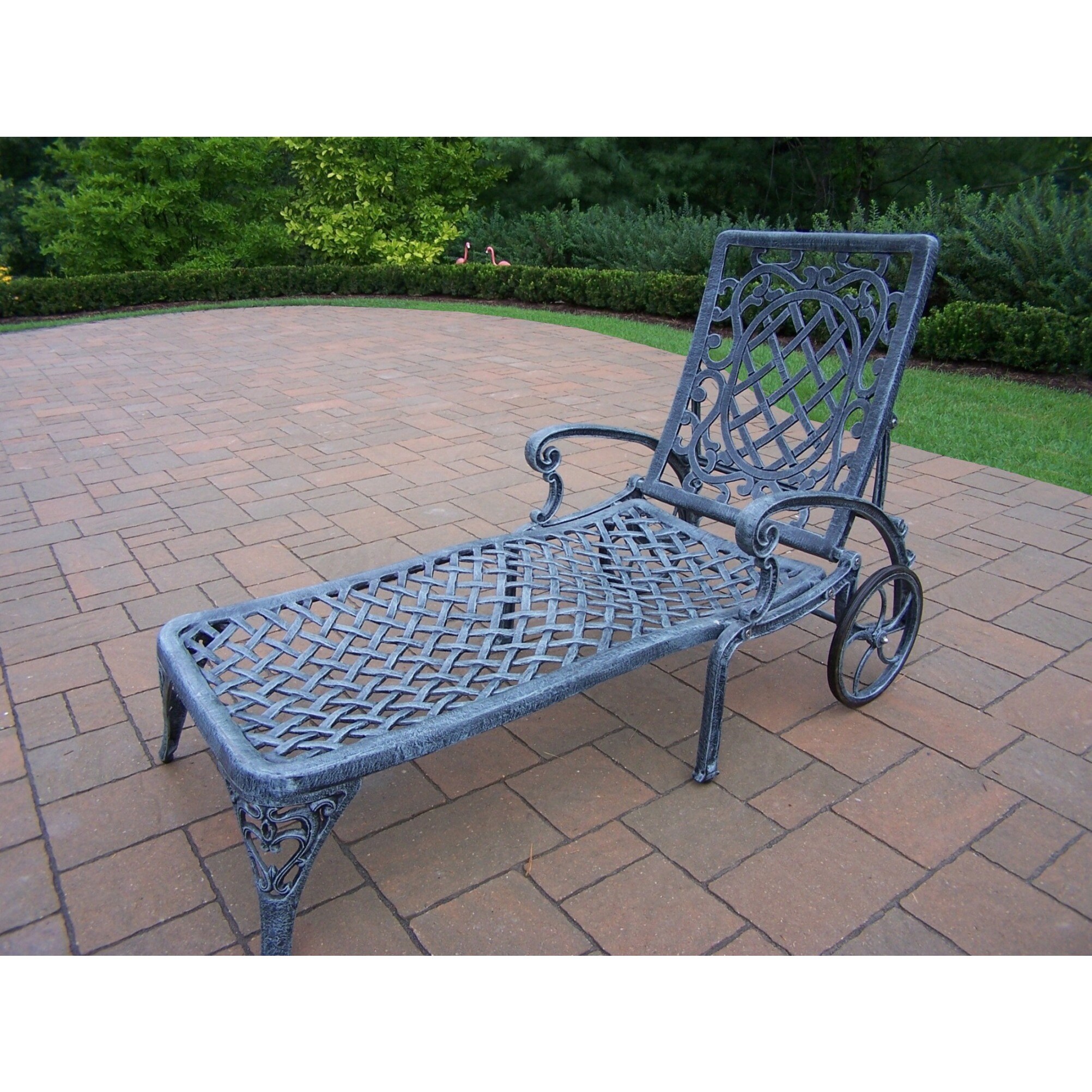 green wrought iron chaise lounge