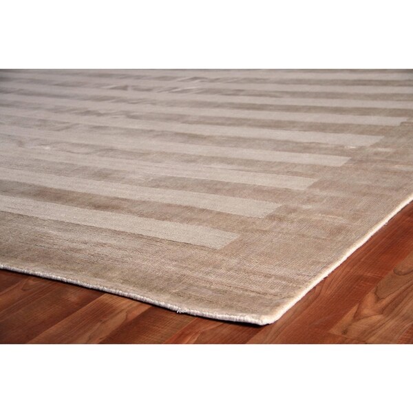 beige viscose rug