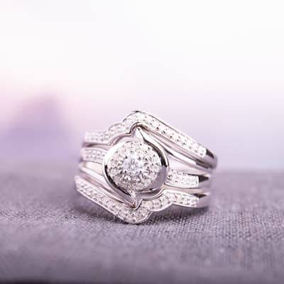 Miadora Sterling Silver 1/3ct TDW Diamond Bypass Halo Bridal Ring Set