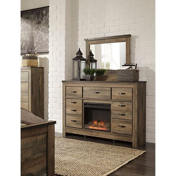 Signature Design by Ashley Trinell Brown Dresser with Fireplace