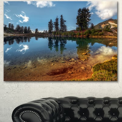 Designart "Clear Lake with Row of Pine Trees" Extra Large Landscape Art Canvas - Blue