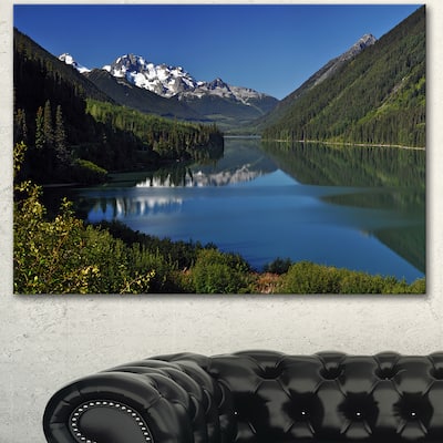 Designart "Calm Clear Lake with Mountains" Extra Large Landscape Art Canvas