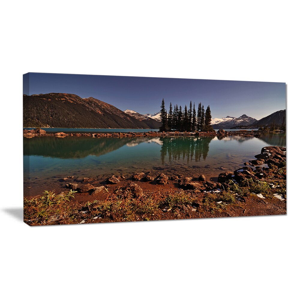 Designart 'Lake and Pine Trees in Evening' Extra Large Landscape Framed Canvas Art Print - 20 in. Wide x 12 in. High
