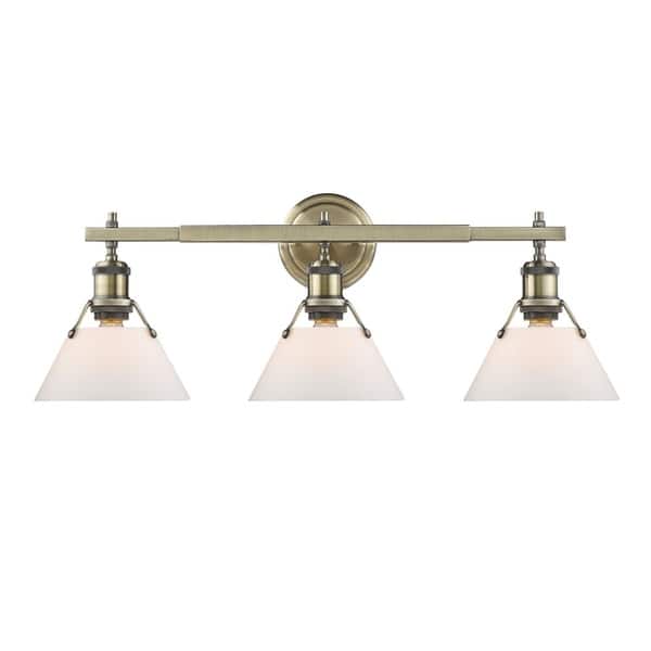 slide 2 of 3, Golden Lighting Orwell AB Gold Aged-brass Finish Steel-frame 3-light Bath Vanity Fixture with Opal Glass Shades