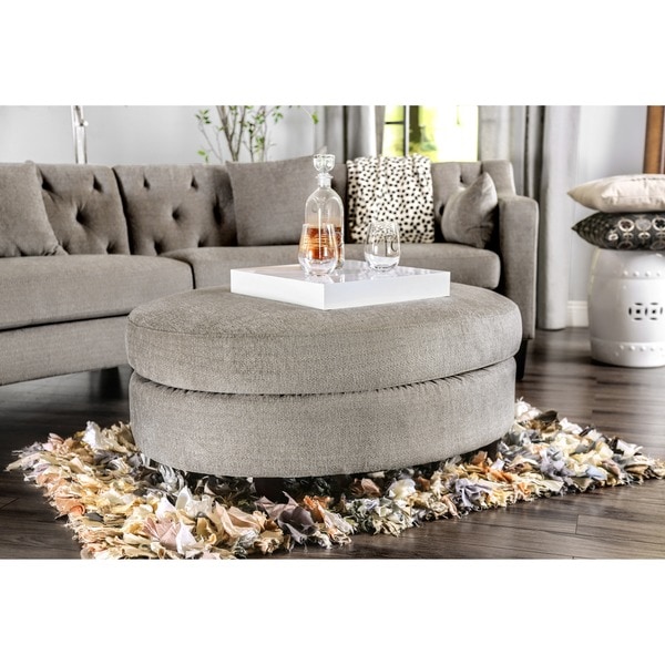 oval upholstered coffee table