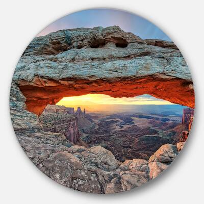 Designart 'Sunrise at Mesa Arch in Canyon lands' Landscape Large Disc Metal Wall art