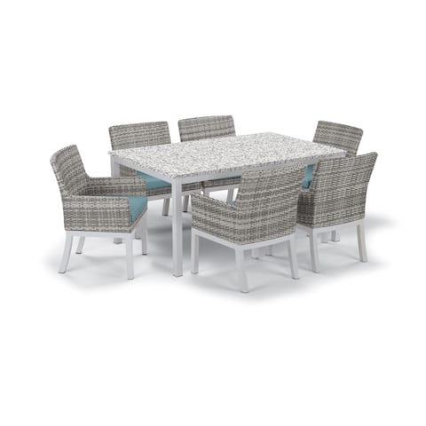 Oxford Garden Travira 7-Piece Dining Set with 63-in x 40-in Lite-Core Ash Table, Argento Wicker with Ice Blue Cushion