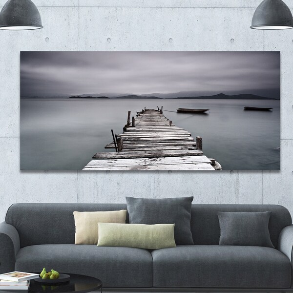 Designart 'Pier and Boats at Seashore' Bridge and Pier Canvas Wall Art