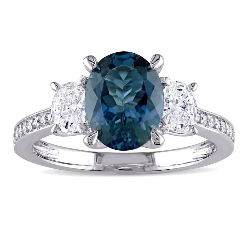 Miadora Signature Collection 14k White Gold London Blue Topaz 5/8ct TDW Oval and Round Diamond Engagement Ring (G-H, I1-I2)