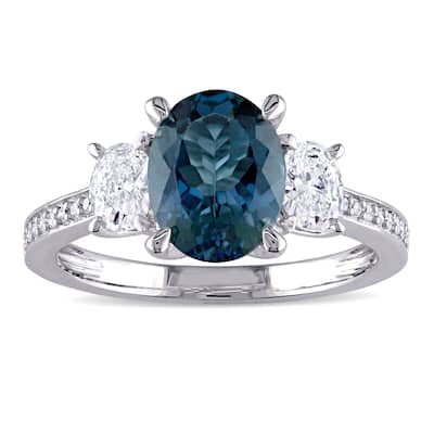 Miadora Signature Collection 14k White Gold London Blue Topaz 5/8ct TDW Oval and Round Diamond Engagement Ring (G-H, I1-I2)
