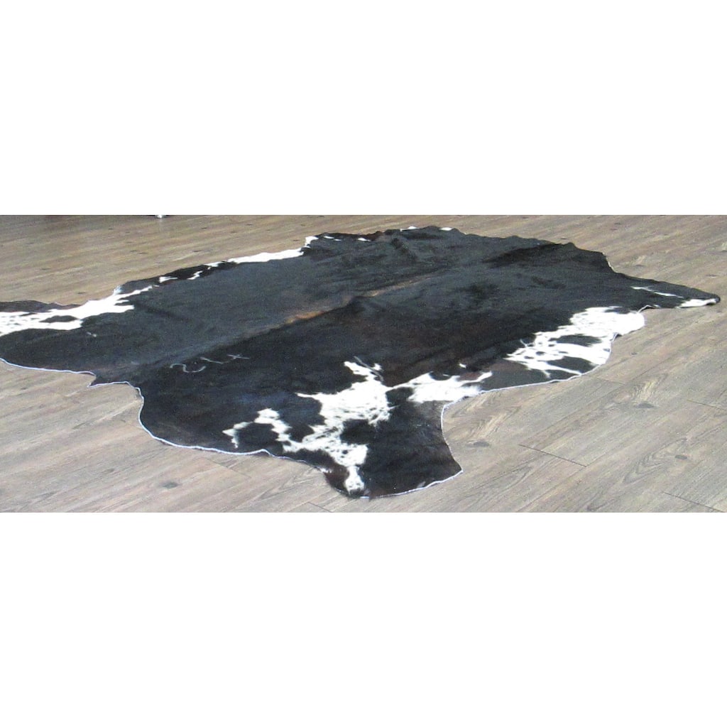 Ultra-soft Black and Off-white Real Cow Hide Rug - 6' x 8'