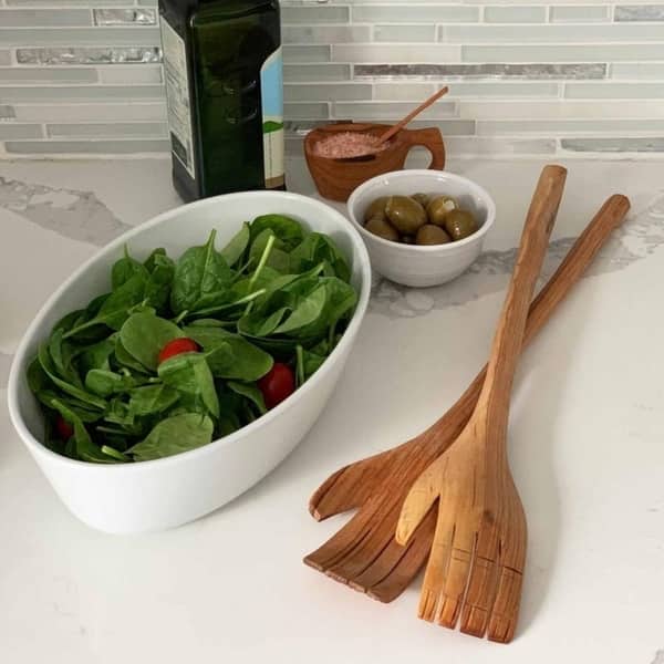 https://ak1.ostkcdn.com/images/products/15278824/Hand-Carved-17-inch-Olive-Wood-Helping-Hands-Salad-Servers-Kenya-2681f622-0d11-4440-bc2e-3f3aaab35530_600.jpg?impolicy=medium