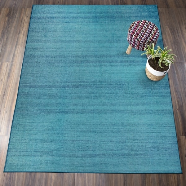 https://ak1.ostkcdn.com/images/products/15410349/RUGGABLE-Washable-Stain-Resistant-Pet-Area-Rug-Solid-Textured-Ocean-Blue-5-x-7-eceaa7a8-f1d3-4076-ae42-2acc4f5cda03_600.jpg?impolicy=medium