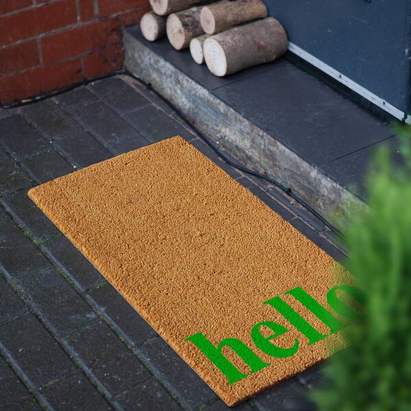 https://ak1.ostkcdn.com/images/products/15951569/Vertical-Hello-Doormat-Natural-Green-24-x-36-6ad9e1a8-1a8c-42f8-a2db-a141f5851f98_600.jpg?impolicy=medium