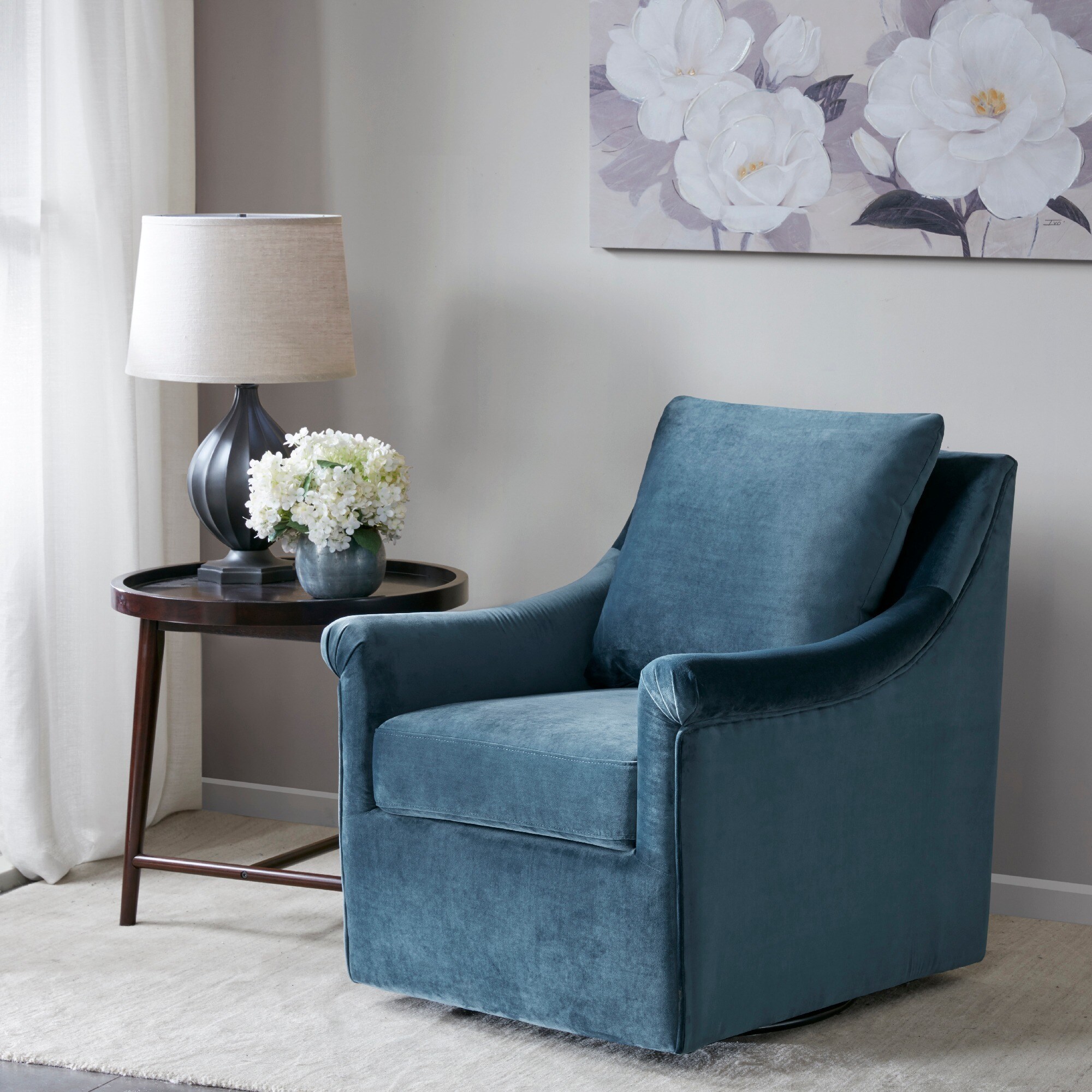 blue swivel chair living room