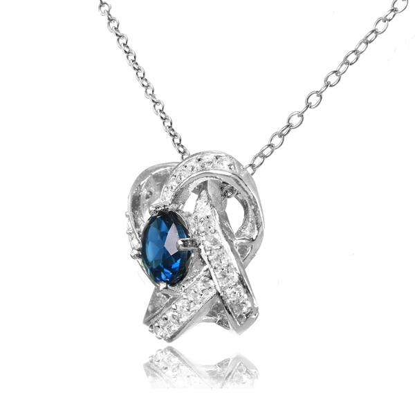 Sterling Silver Peridot and White Topaz Love Knot Necklace Sterling Silver Peridot and White Topaz Love Knot Necklace