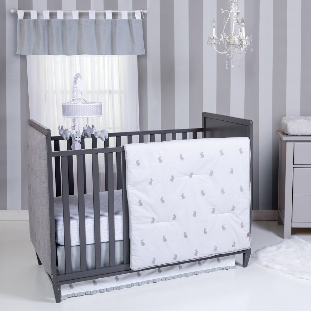 grey and white cot bedding set