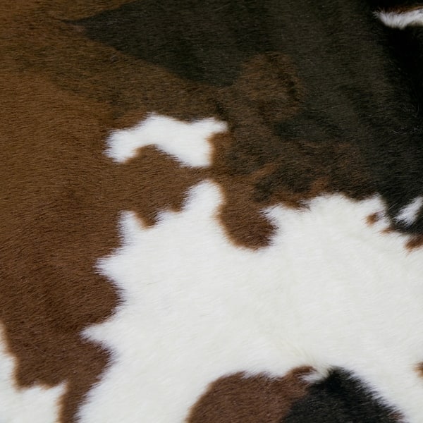 Shop Alecia Faux Cowhide Brown And White Area Rug 68 Inch By 50