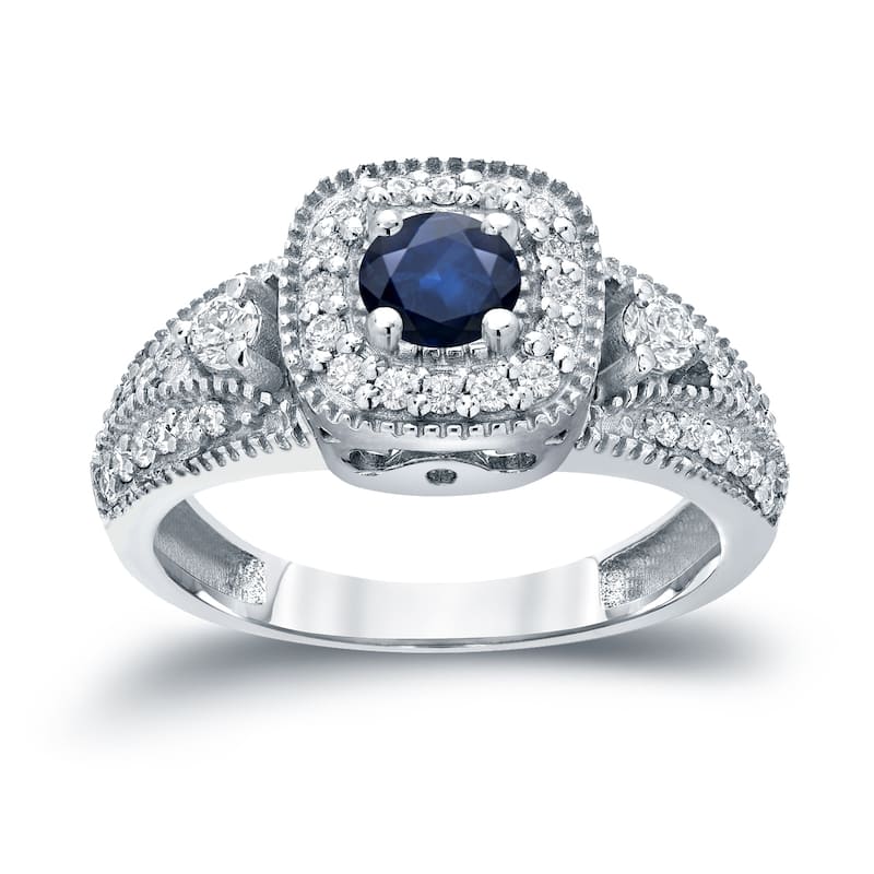 Three Stone 1/5ct Blue Sapphire and 2/5ct TDW Diamond Halo Engagement Ring in 14k Gold by Auriya