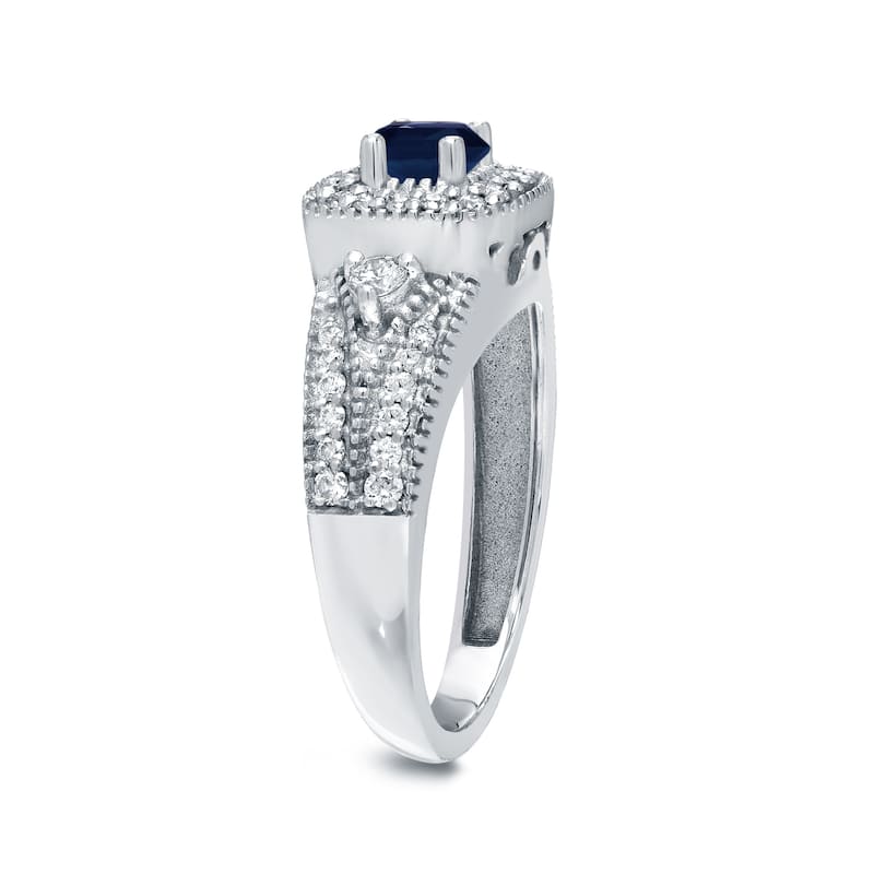 Three Stone 1/5ct Blue Sapphire and 2/5ct TDW Diamond Halo Engagement Ring in 14k Gold by Auriya