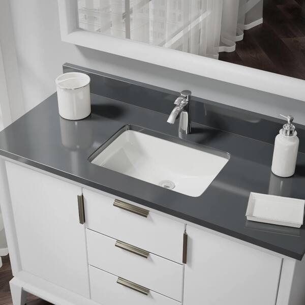 Under-Mount Porcelain Bathroom Sink in Biscuit with Pop-Up Drain in Antique Bronze Under-Mount Porcelain Bathroom Sink in Biscuit with Pop-Up Drain in Antique Bronze
