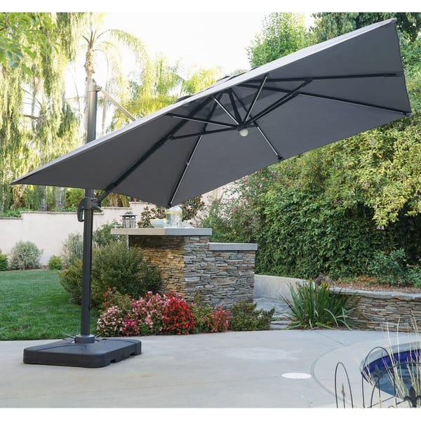 Shop Black Friday Deals On Delray Outdoor 9 7 Ft Canopy Umbrella With Base And Solar Light Strip By Christopher Knight Home Overstock 17156875