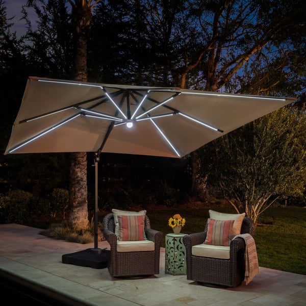 Shop Black Friday Deals On Delray Outdoor 9 7 Ft Canopy Umbrella With Base And Solar Light Strip By Christopher Knight Home Overstock 17156875