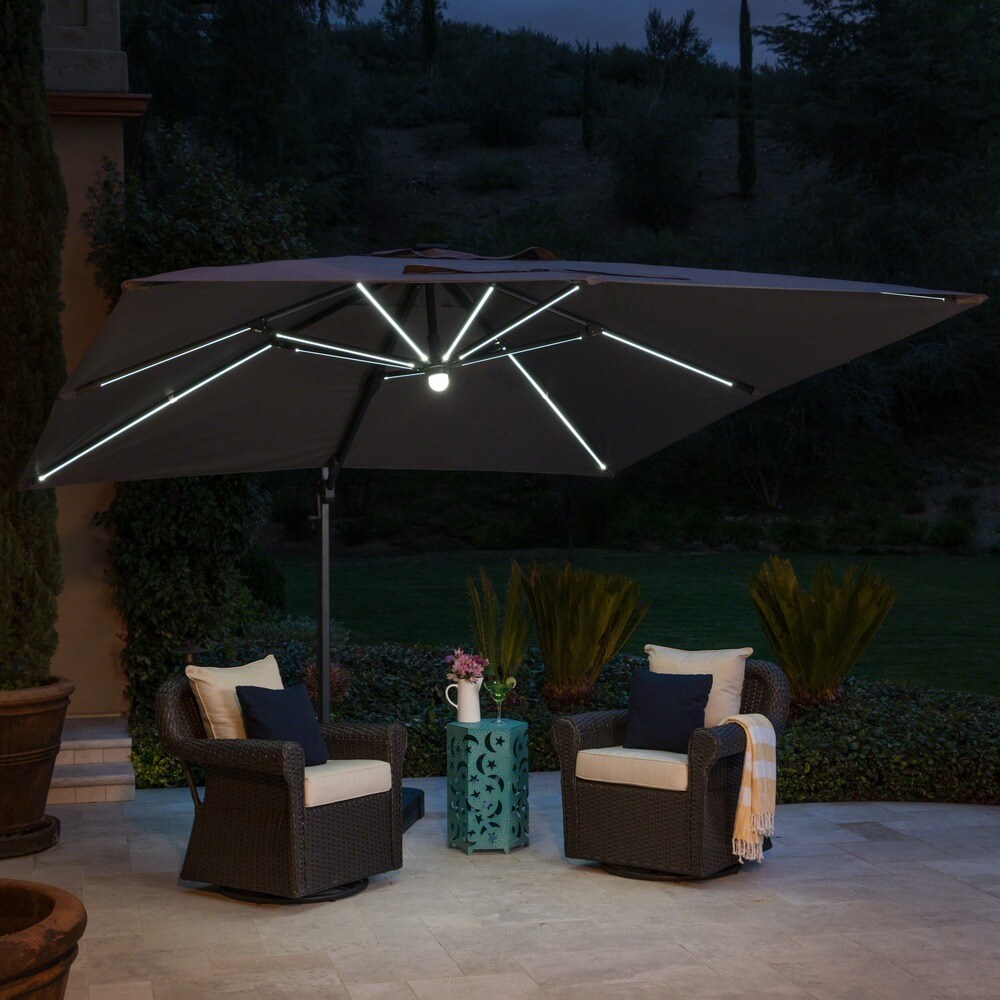 Shop Black Friday Deals On Delray Outdoor 9 7 Ft Canopy Umbrella With Base And Solar Light Strip By Christopher Knight Home Overstock 17156875