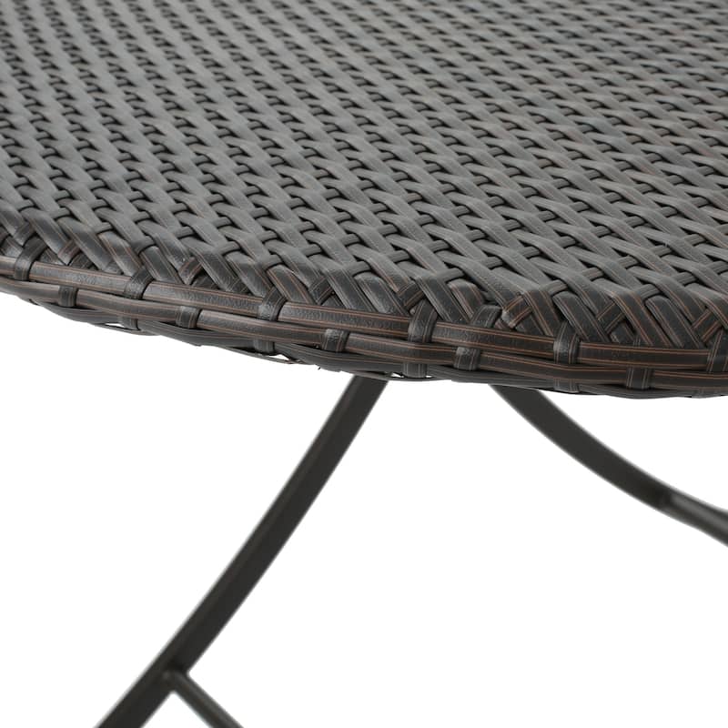 Rai Outdoor 5-Piece Round Foldable Wicker Dining Set with Umbrella Hole by Christopher Knight Home