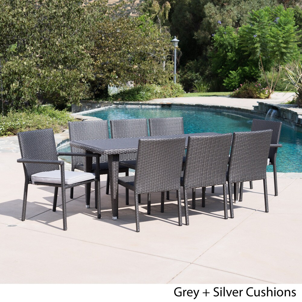 https://ak1.ostkcdn.com/images/products/17778363/Grady-Outdoor-9-piece-Rectangular-Wicker-Dining-Set-with-Cushions-by-Christopher-Knight-Home-408ad2ce-7447-4768-af45-6681bc141f06_1000.jpg