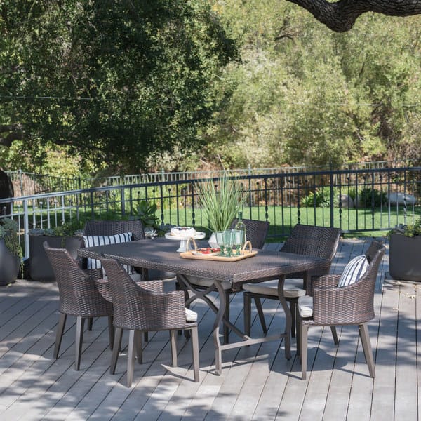 slide 1 of 7, Harland Outdoor 7-piece Rectangular Wicker Aluminum Dining Set with Cushions by Christopher Knight Home
