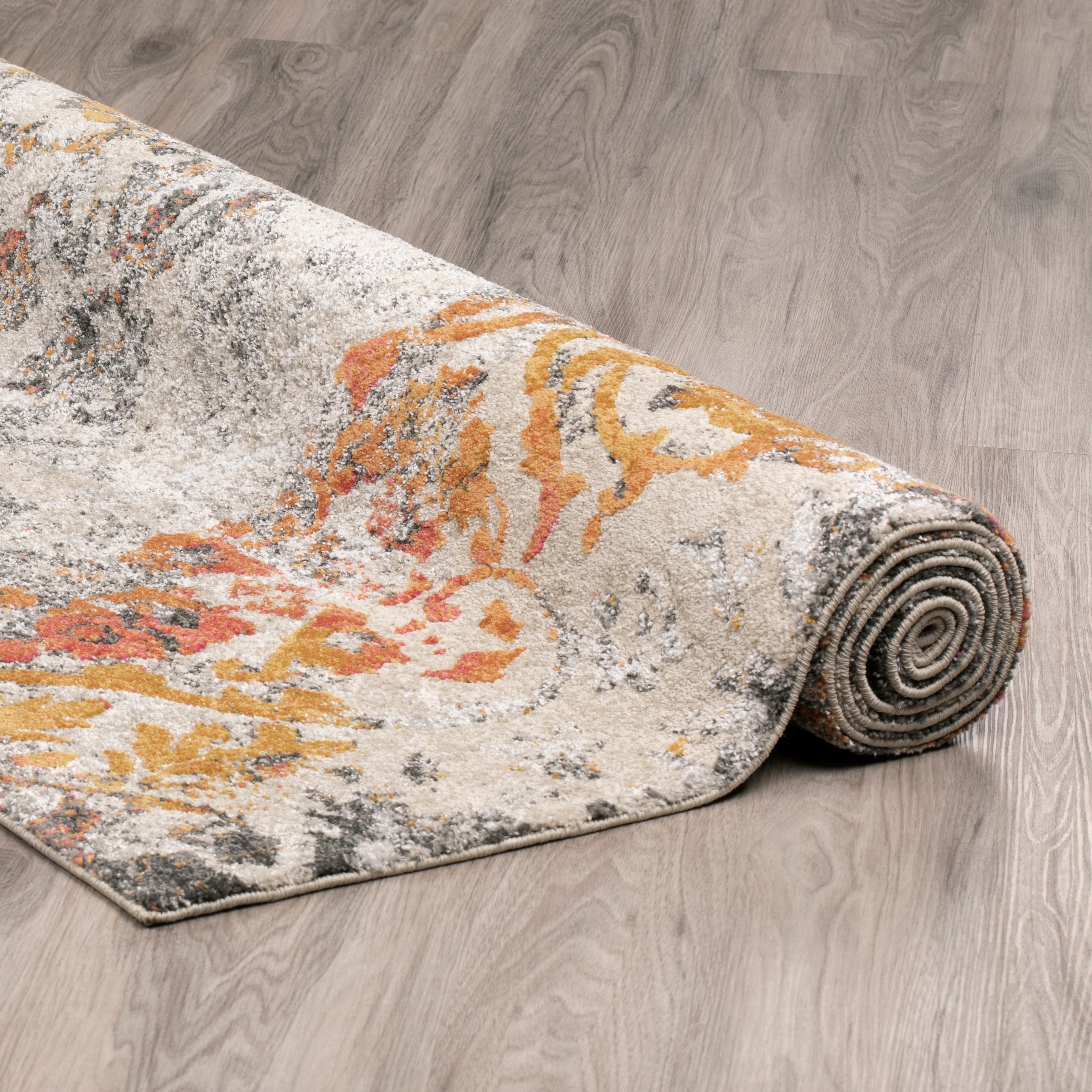 https://ak1.ostkcdn.com/images/products/18272528/Addison-Platinum-Distressed-Damask-Grey-Orange-Area-Rug-33-x-53-40064751-5a8e-4656-bfc4-edce5312ef64.jpg