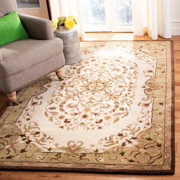 Safavieh Handmade Heritage Timeless Traditional Beige Wool Rug - 4' x 6'