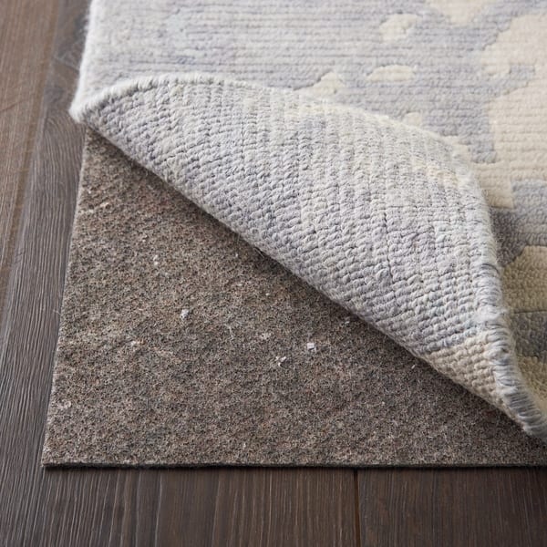 https://ak1.ostkcdn.com/images/products/18825230/Nourison-Rug-Loc-Rug-Pad-Brown-c38f24e9-7455-4df8-92e9-4510f425f271_600.jpg?impolicy=medium