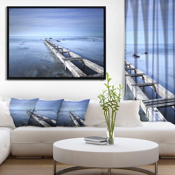 Designart 'Dark Blue Sky and Large Pier' Seascape Framed Canvas Art Print