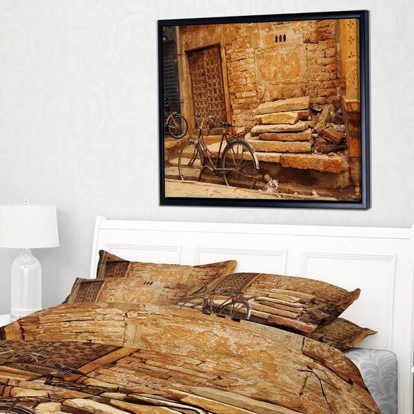 Designart 'Bicycle against Brown Wall' Landscape Photo Framed Canvas Art Print