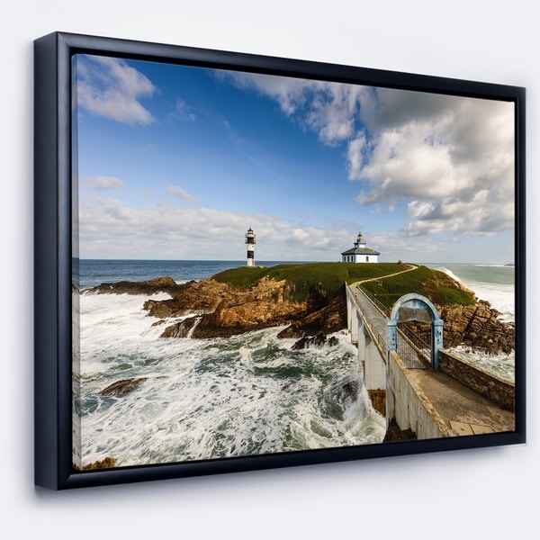 Designart 'Bright Illa Pancha Lighthouse' Seashore Photo Framed Canvas Print