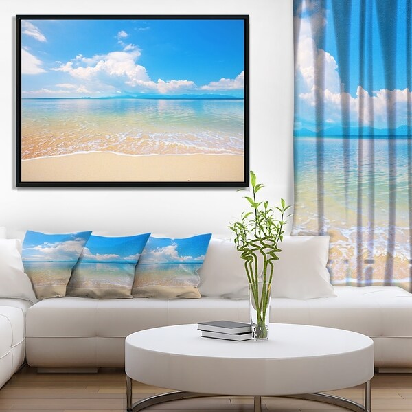 Designart 'Large Clouds Over Calm Beach' Seashore Photo Framed Canvas Print