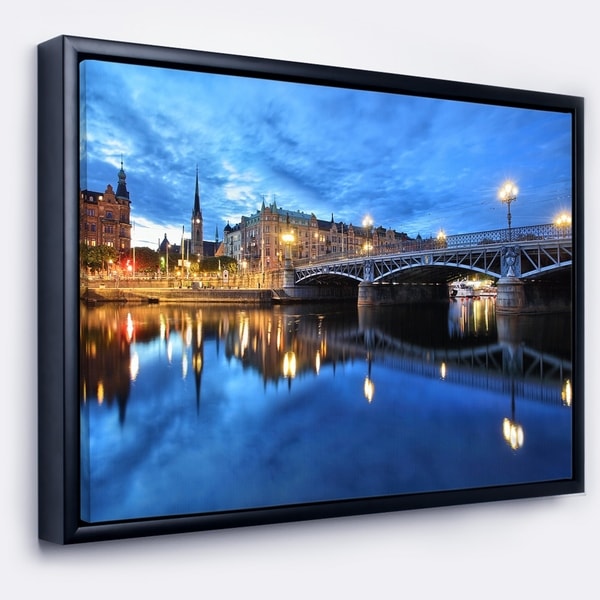 Designart 'Illuminated Blue Stockholm' Cityscape Framed Canvas Print