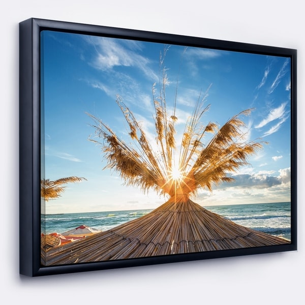 Designart 'Vivid Sunrise on Sandy Beach' Seascape Framed Canvas Art Print