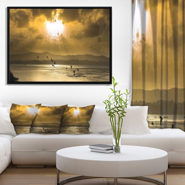 Designart 'Glittering Sun Among heavy Clouds' Large Seashore Framed Canvas Print