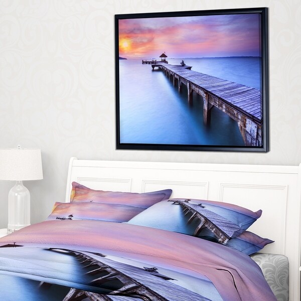 Designart 'Beach with Blue Waters and Wood Bridge' Pier Seascape Framed Canvas Art Print