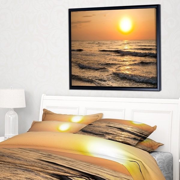 Designart 'Typical Sunrise with Tranquil Waves' Seascape Framed Canvas Art Print