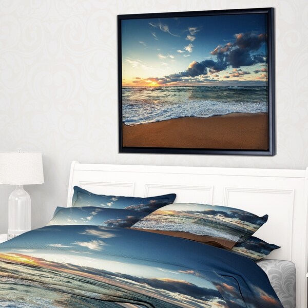 Designart 'Sunrise and Glowing Waves in Ocean' Seascape Framed Canvas Art Print