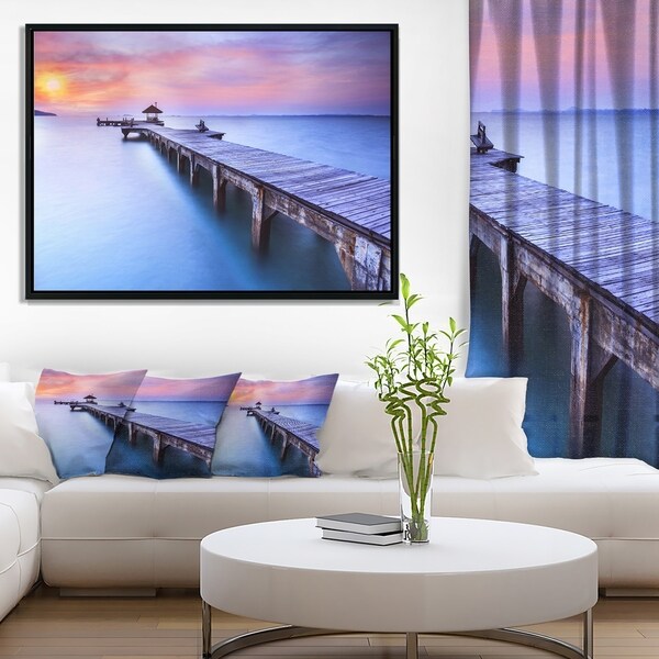 Designart 'Purple Seas and Long Wooden Pier' Pier Seascape Framed Canvas Art Print