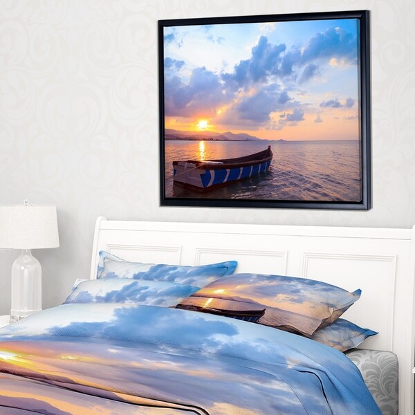 Designart 'Small Fishermen Boat at Sunset' Modern Seashore Framed Canvas Art
