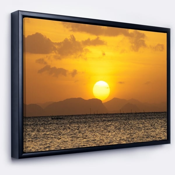 Designart 'Yellow Sunset and Brown Ocean' Seashore Framed Canvas Art Print