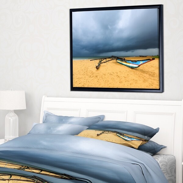 Designart 'Beach with Dark Clouds above Ocean' Large Seashore Framed Canvas Art Print