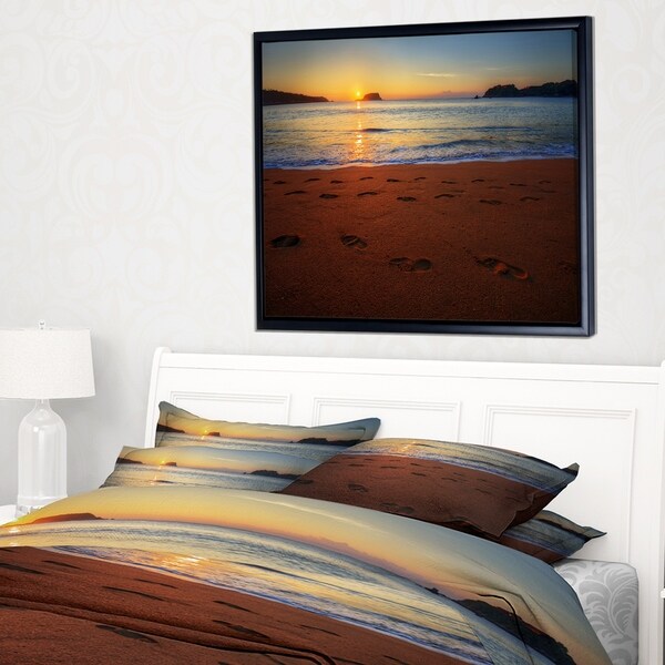 Designart 'Foot printed Sandy Ocean Beach' Seashore Framed Canvas Art Print