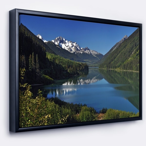 Designart 'Calm Clear Lake with Mountains' Extra Large Landscape Framed Canvas Art Print
